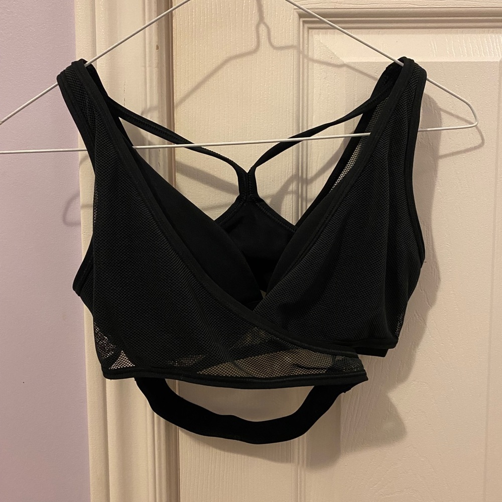 Nike black wraparound sport bra with mesh detail